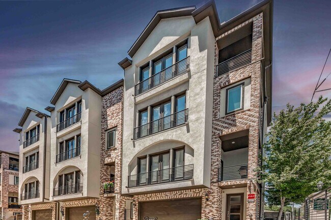 Building Photo - Luxury End Unit Rental with Elevator, Down...