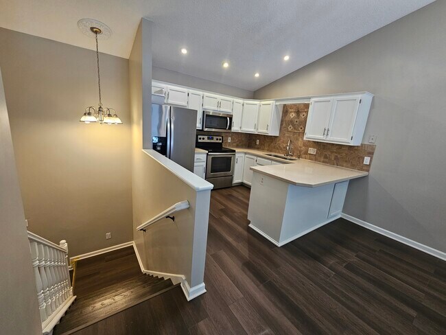 Kitchen/Entryway Stairway - 15951 Hyland Pointe Ct
