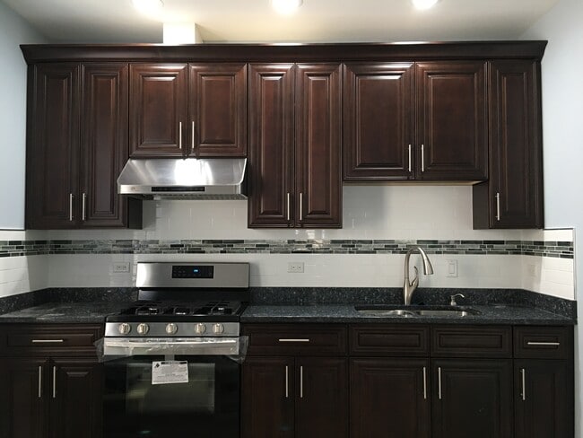 Kitchen with tall cabinets - 3232 S Morgan St
