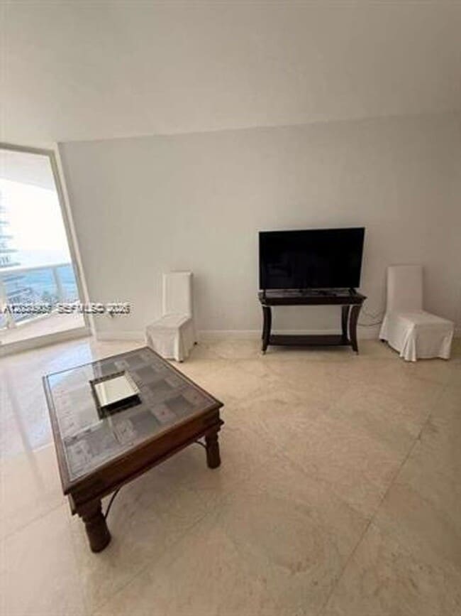 Building Photo - 9595 Collins Ave