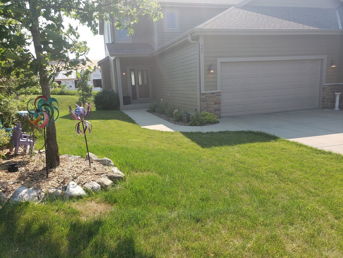 Front Door and Garage Entry - 407 Century Oak Dr