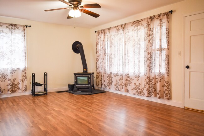 Living room with wood stove - 212 Middle Pownal Rd