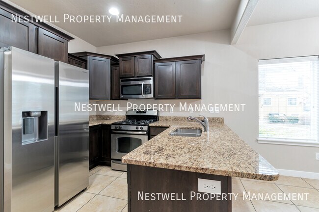Foto del edificio - 3766 Periwinkle Dr