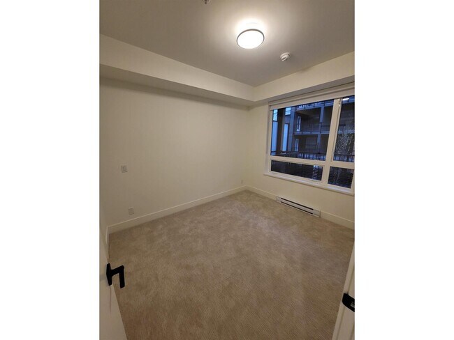 Photo du bâtiment - 8320-208B 208 St