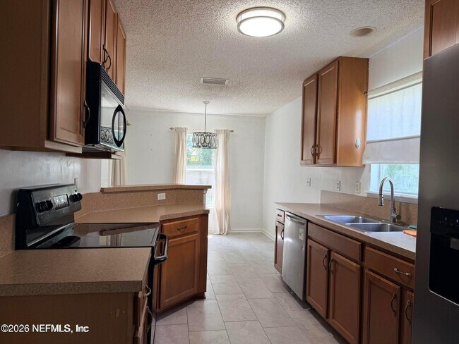 Foto del edificio - 6423 Crimson Leaf Ln