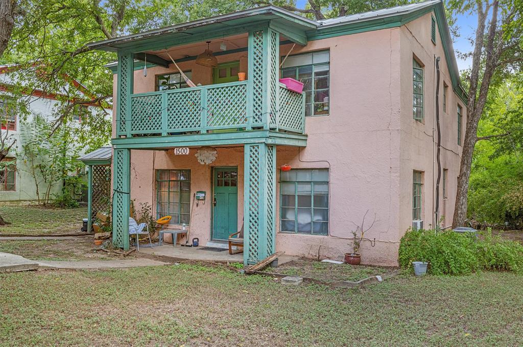 Front of duplex. Unit B is the top floor, so it includes the front-facing balcony. - 1500 Kirkwood Road
