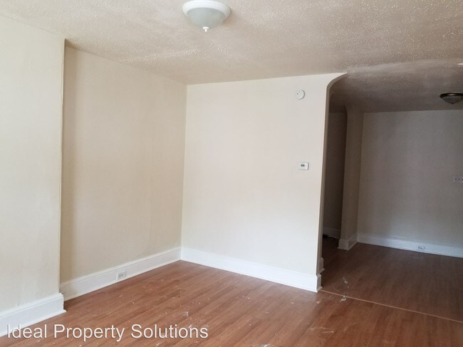 Building Photo - 4 br, 2 bath House - 222 W. 25th Street