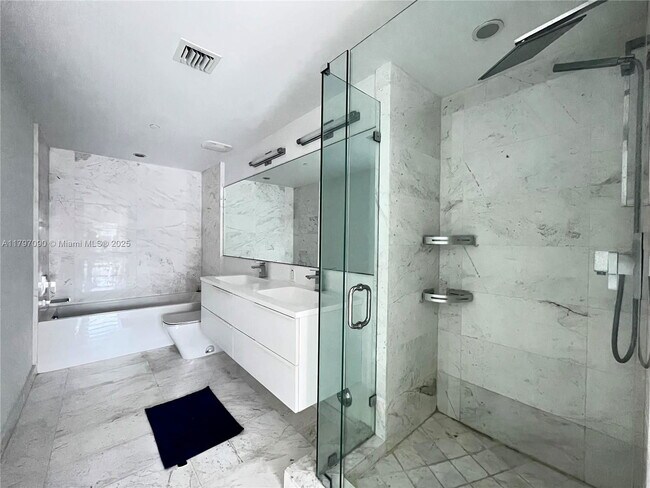 Foto del edificio - 9940 W Bay Harbor Dr
