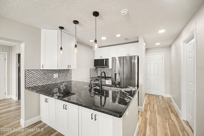 Building Photo - 8741 Seagrape Ct
