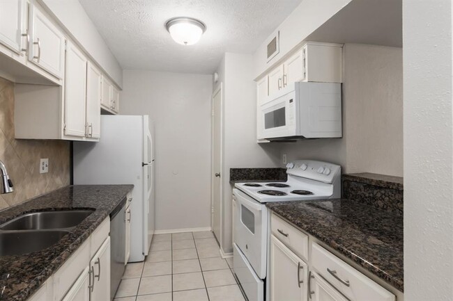 Foto del edificio - 10555 Turtlewood Ct