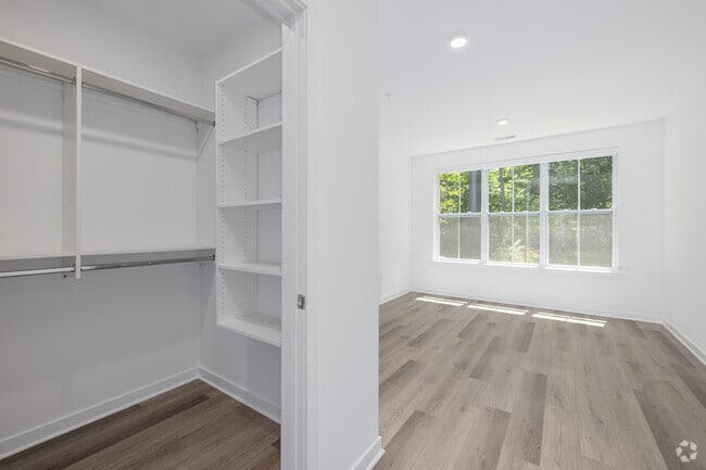 2BR, 2BA - 1,100SF - Primary Bedroom/Walk-in Closet - The Kingsley
