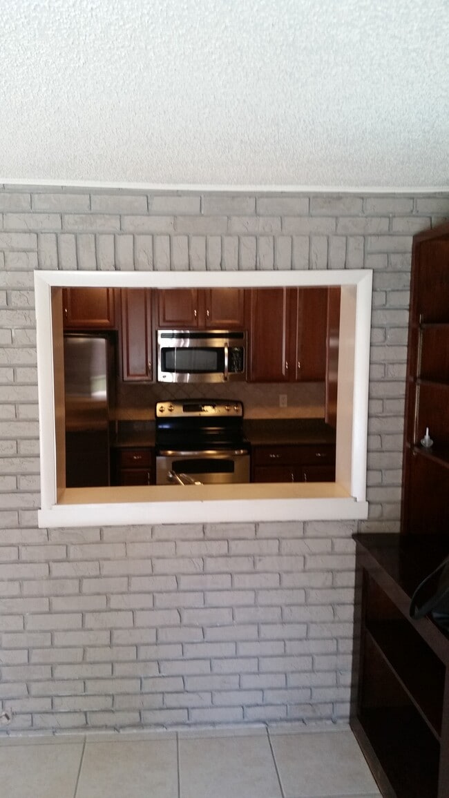 Pass through to kitchen from TV room - 636 Tulane Ave