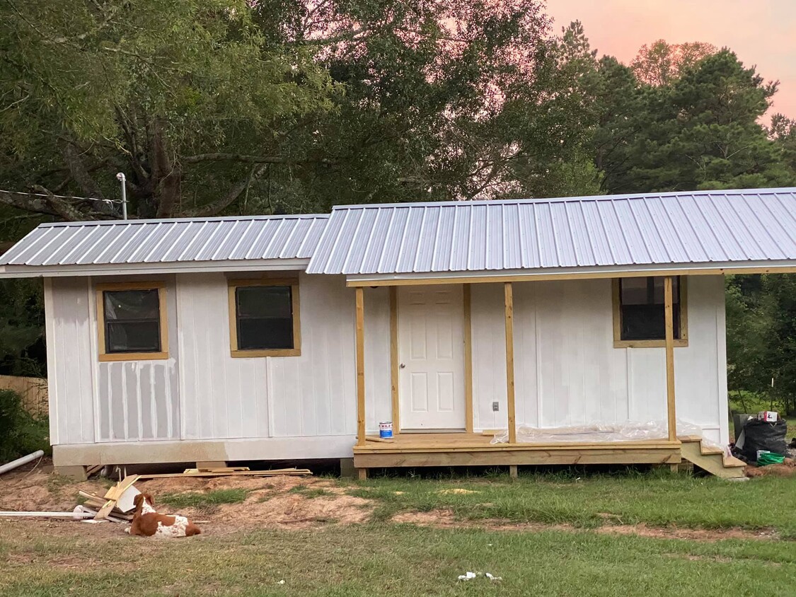 Not quite finished - Putting the last of the paint on the outside and inside - 807 Pine Street