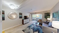 Located at 2680 Fayette Dr in Mountain View, CA, this single-floor residence offers a well-organized and comfortable layout with distinct living, sleeping, cooking, and bathing areas.

The living room is the centerpiece of the home, featuring soft carpeted flooring, neutral-toned walls, and generous natural light streaming in through large sliding glass doors that open onto a private balcony with greenery views. The open, airy atmosphere is complemented by tray ceiling details that add architectural interest to the space.

The kitchen is efficiently designed with warm wood cabinetry, granite-style countertops, light hardwood flooring, and a full suite of white appliances including a refrigerator, range, microwave, and dishwasher. The layout maximizes functionality while maintaining a clean, classic aesthetic.

The bedroom is a tranquil retreat with soft natural light filtering through a window overlooking lush outdoor greenery. The room provides ample space for furnishings and features easy access to the bathroom area.

The bathroom is finished with rich wood-toned cabinetry, granite countertops, and light hardwood flooring. It includes a full shower-tub combo and connects seamlessly to a walk-in closet, offering practical and organized storage. Overall, the residence presents a cohesive, comfortable living environment in the heart of the San Francisco Bay Area.