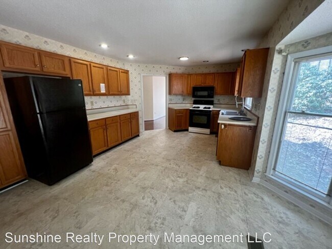 Building Photo - 4 br, 2.5 bath House - 3609 Riverwood Ct