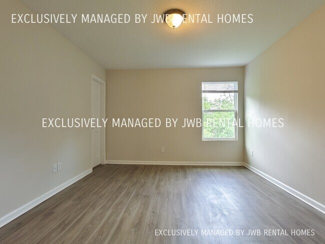 Foto del edificio - 6881 Lake Mist Ln