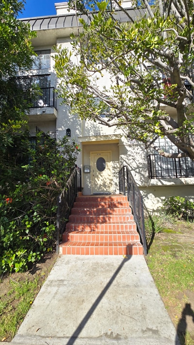 Building Front Door - 12821 Caswell Ave