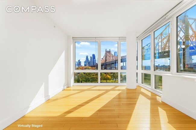 Building Photo - Skyline Splendor: Luxurious 2-Bedroom Retreat with Breathtaking NYC Views