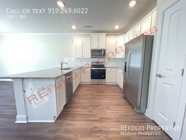 Building Photo - Brand New 3 Bedroom 1-Car Garage End Unit ...