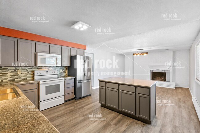 Foto del edificio - 3425 E 57th Ave
