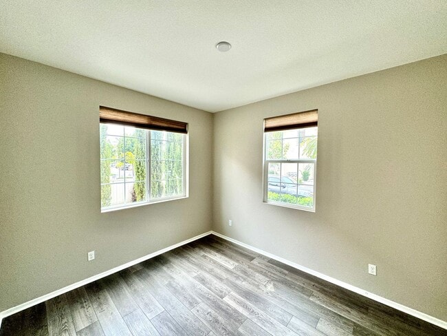 Building Photo - Spacious 4BD/3.5BA Townhome in Oceanside with Community Pool, 2-Car Garage & Covered Balcony