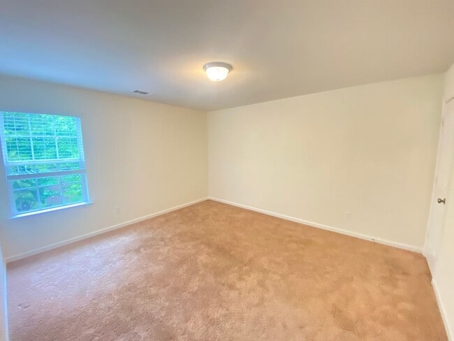 Building Photo - Suburban Tranquility With Urban Convenience