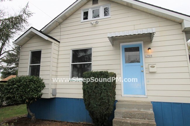 Building Photo - Two Bedroom with Finished Basement Room