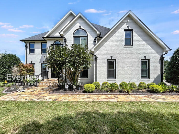 Primary Photo - Spacious 5-Bedroom Home with Modern Amenit...