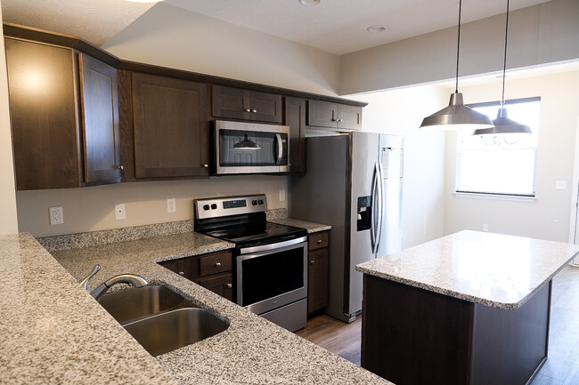 Kitchen features granite countertops, disposal, dishwasher, microwave - 1382 Rural Hill Rd
