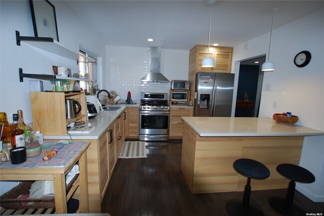 Building Photo - 214-12-214-40 40th Ave