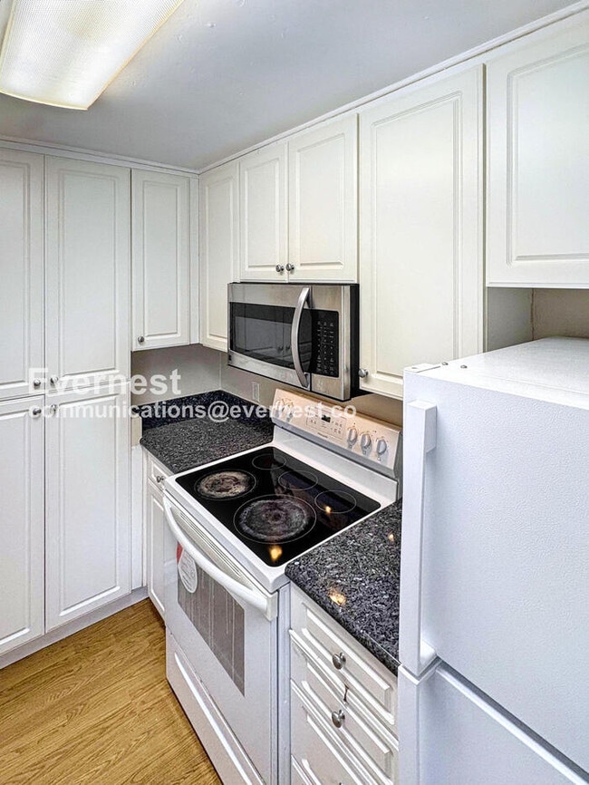 Building Photo - 2-Bed, 1-Bath Condo with Carport and Modern Appliances / Coming Soon!