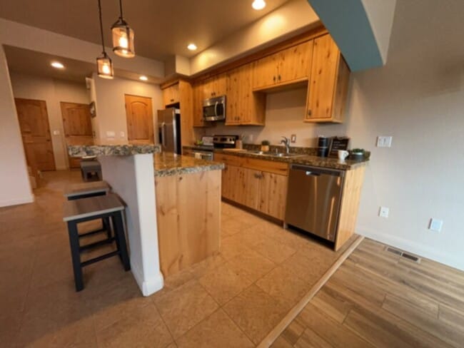 Building Photo - This unique adobe townhome in the heart of...
