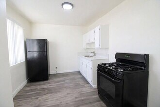 Building Photo - 11120 Normandie Ave