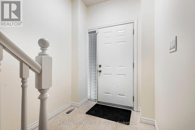 Photo du bâtiment - 619-619 Wild Ginger Ave