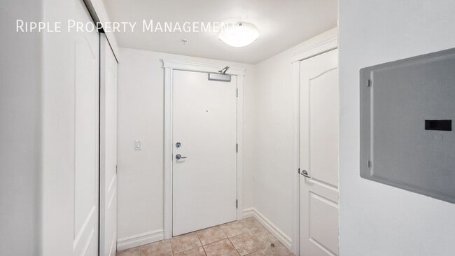 Building Photo - SOPHISTICATED 1-BED + DEN CONDO AT EMERALD STONE | MASSIVE PRIVATE PATIO & AC