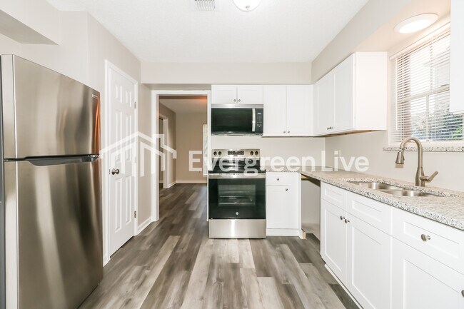 Foto del edificio - 5506 Pine Arbor Dr