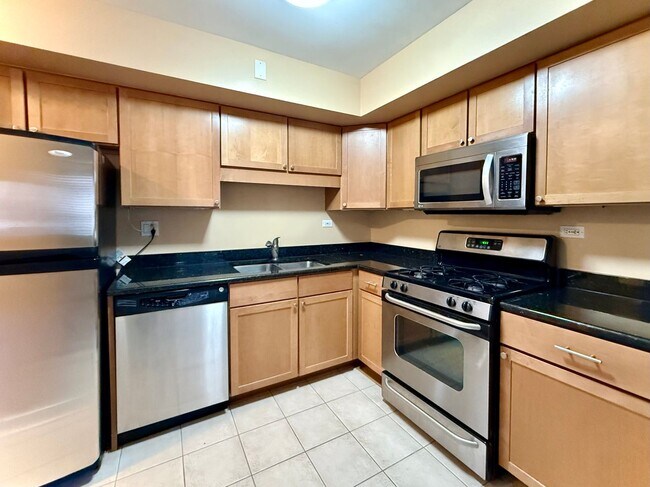Foto del edificio - Pristine 2 Bedroom, 1 Bathroom Condo Available NOW! Heat, Water, & Parking INCLUDED in Rent!
