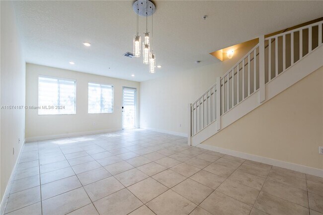 Foto del edificio - 6425 NW 103rd Place Unit 107