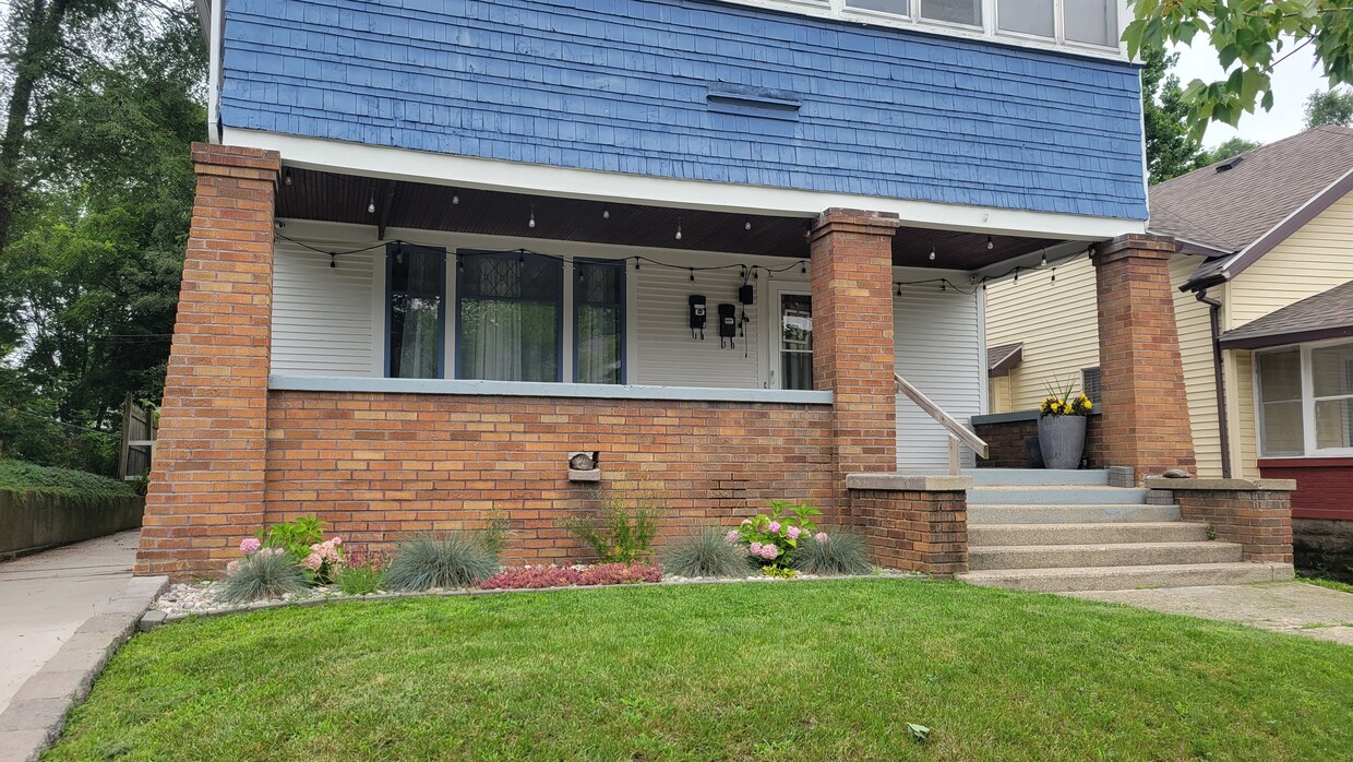 street view / upstairs apt entry at rear of house - 1019 Widdicomb Ave NW