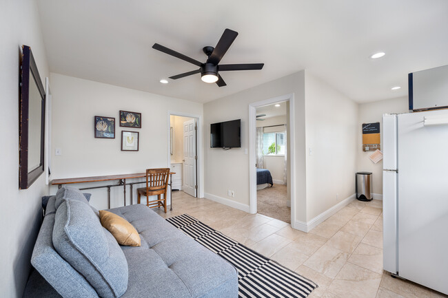 Living Room as seen from stairs - 327 Kihapai St