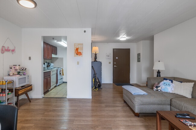 2BR, 1BA - 800SF - Living Room - The Graduate Apartments