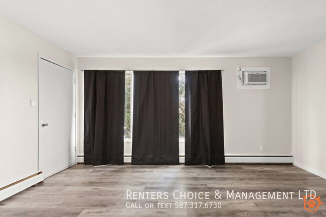 Building Photo - Top Floor Unit, Assigned Parking, Onsite Laundry, BONUS INCENTIVE