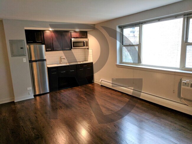 Foto del edificio - 6119 N Kenmore Ave