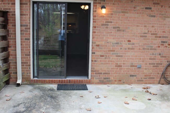 Patio on rear of condo facing Woods... - 3730 Old Flowery Branch Road