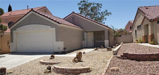 Foto del edificio - 8909 W Colorful Pines Ave