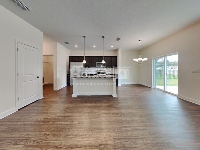 Building Photo - 6609 Hidden Rose Place