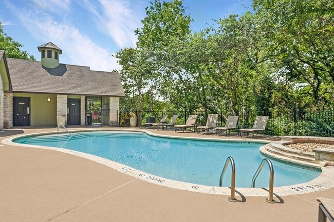 Community pool with lounge chairs - Museo and Channings Mark