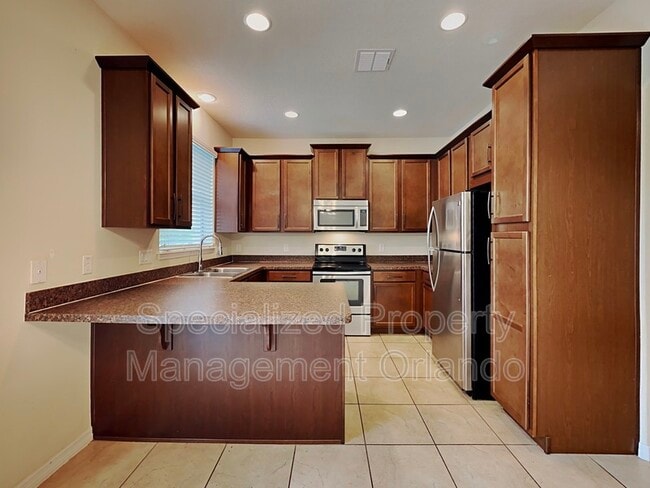 Building Photo - 9685 Silver Buttonwood St