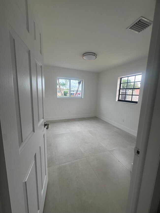 Building Photo - 9830 SW 12th Ter