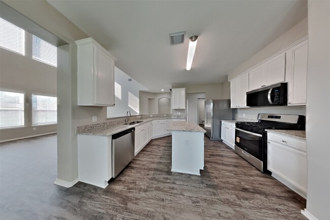 Foto del edificio - 5015 Mossy Bridge Dr